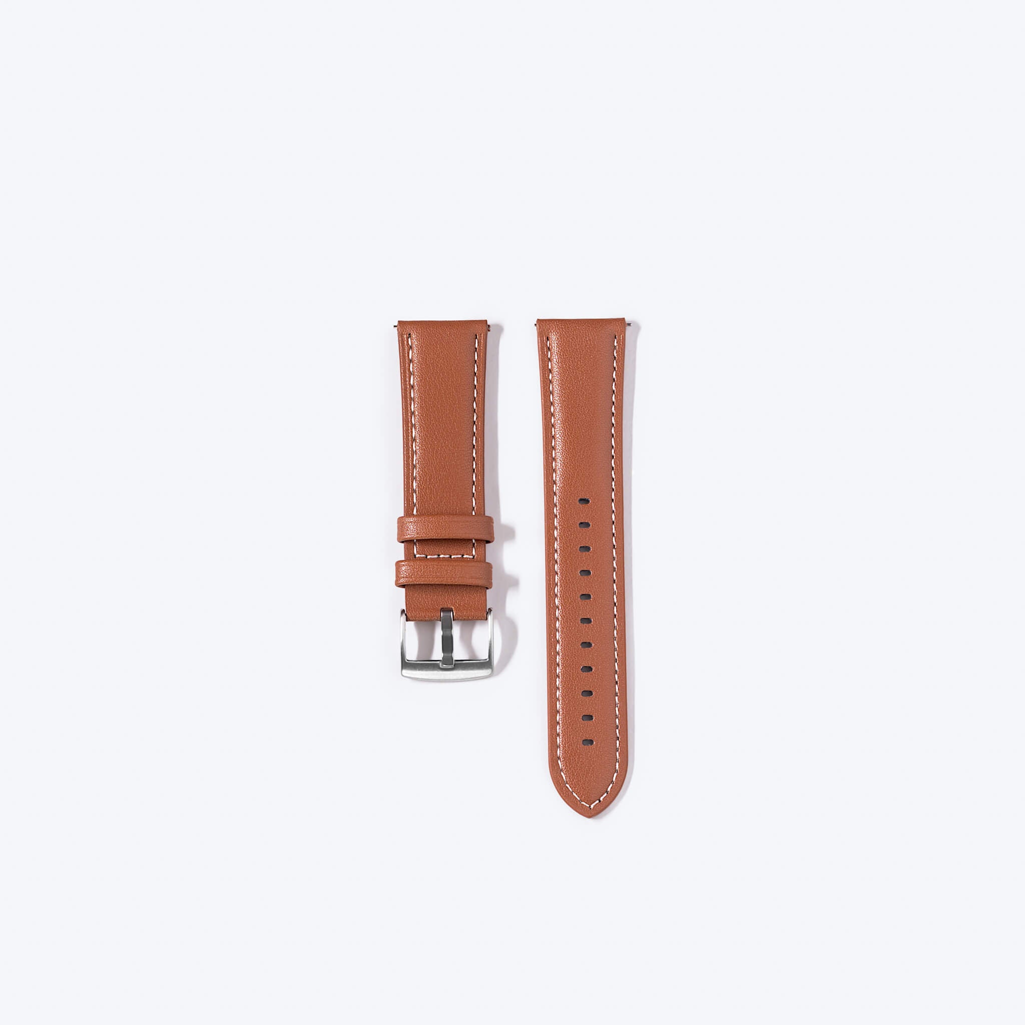 brown leather strap in plain background.