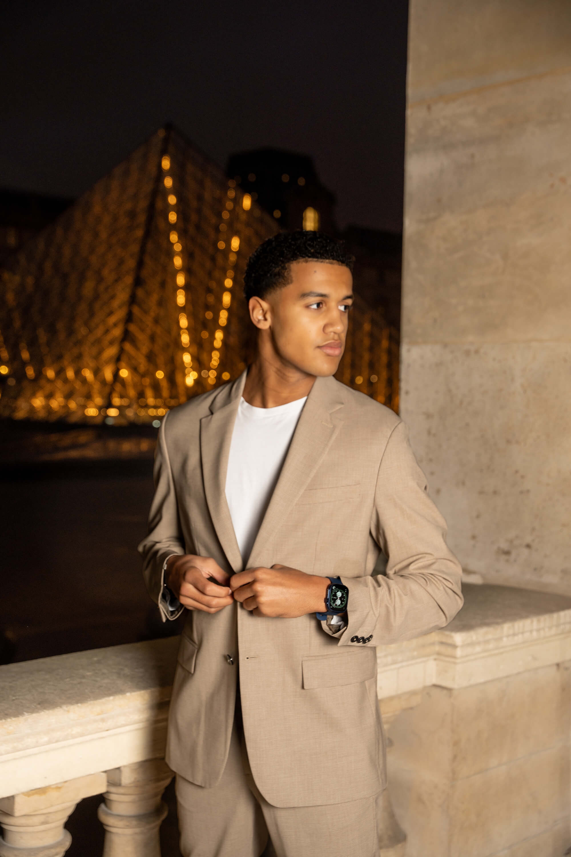 model louis wearing blue lynx smartwatch in paris.