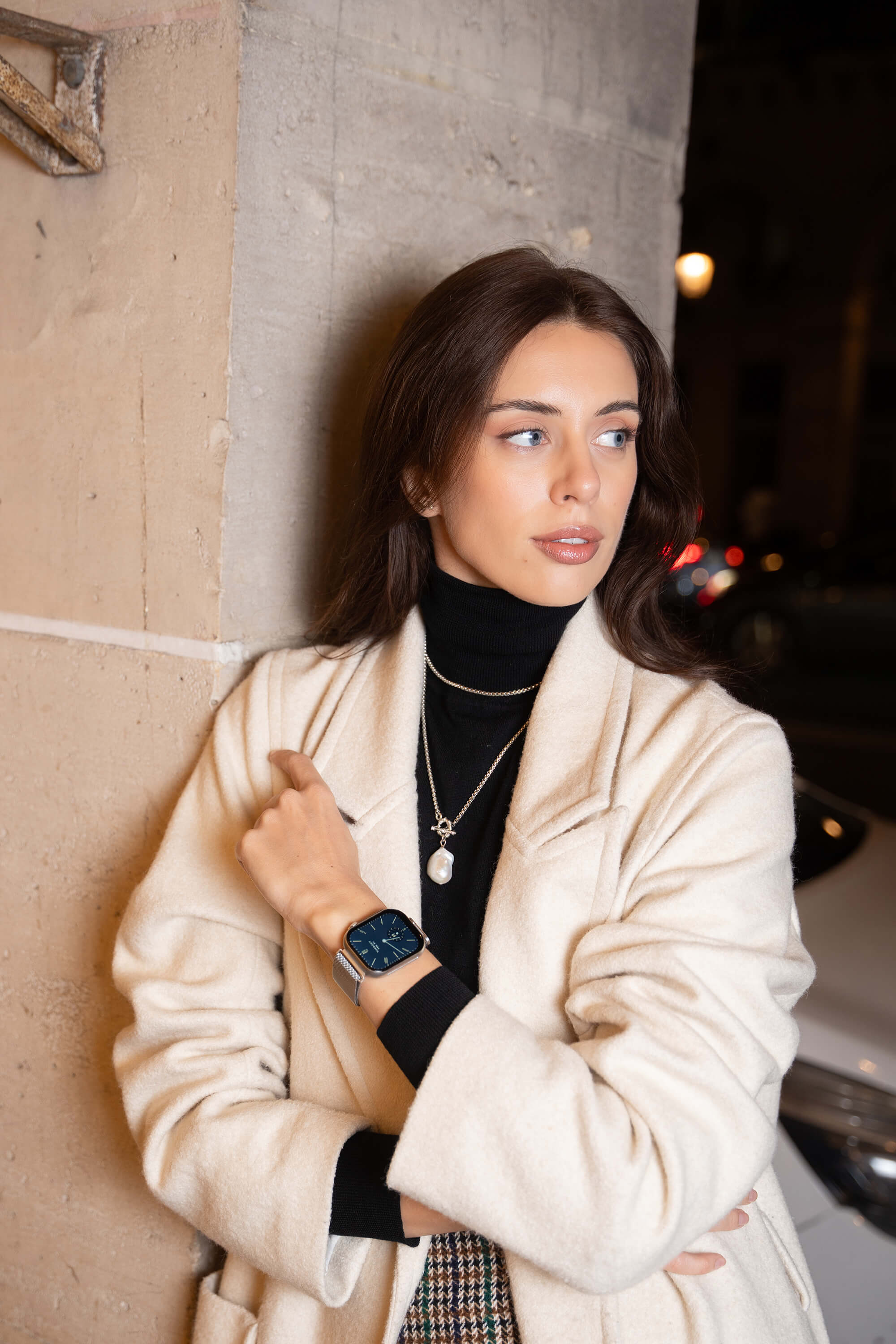 Model Viktoria wearing silver prime smartwatch in the streets of London.